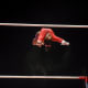 Biles on the uneven bars at the 2015 World Gymnastics Championships.